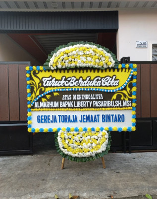 Papan Bunga Duka di Mantasi